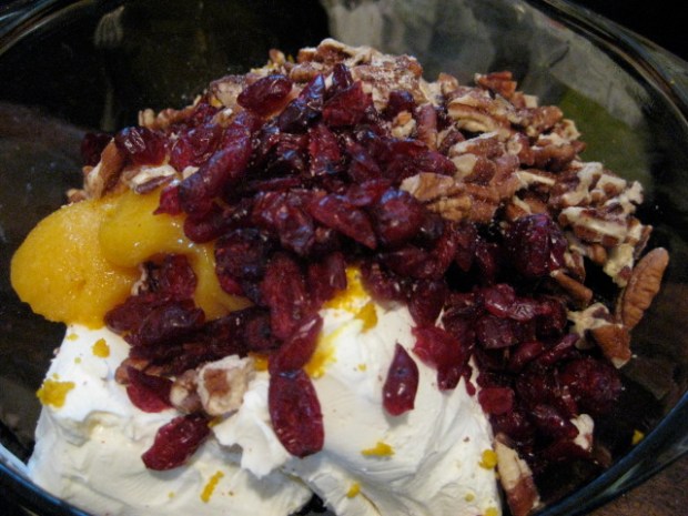 cream cheese, craisins, orange juice concentrate, orange zest, pecans, cinnamon